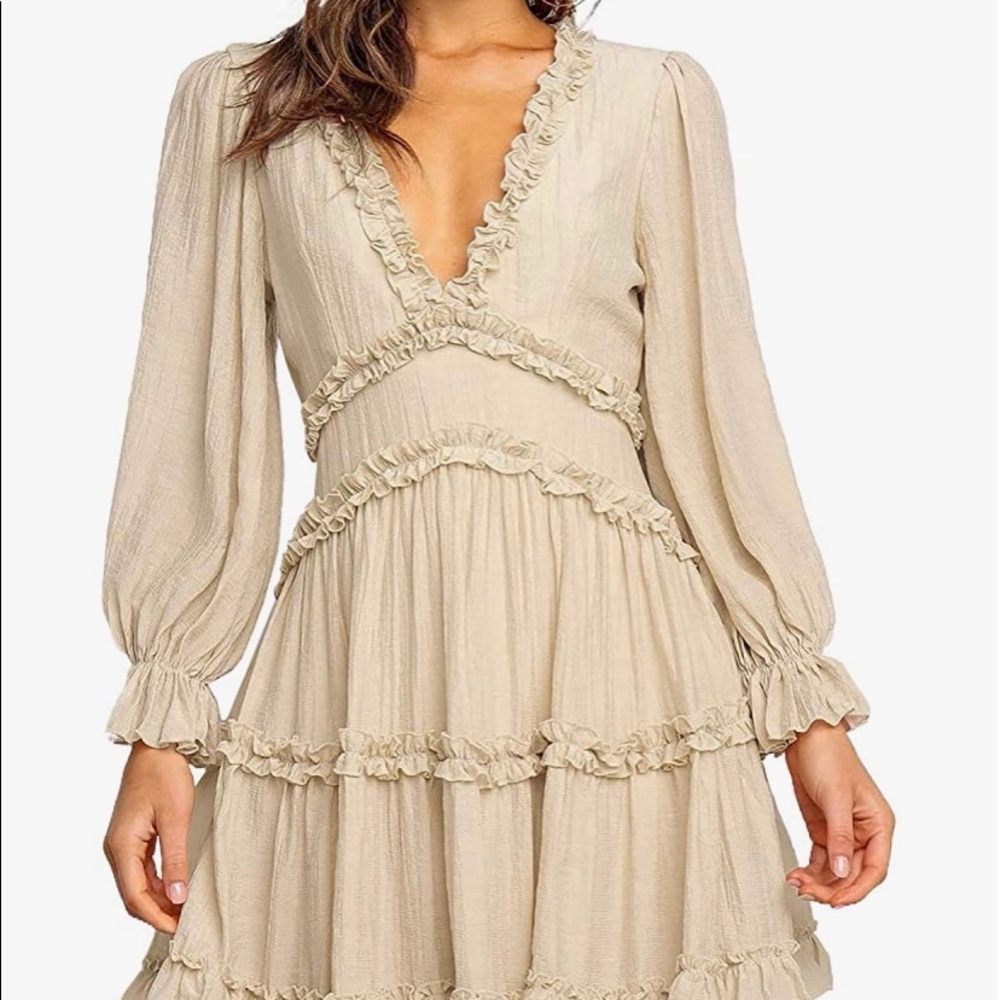 Large cream colored dress with cut out in back